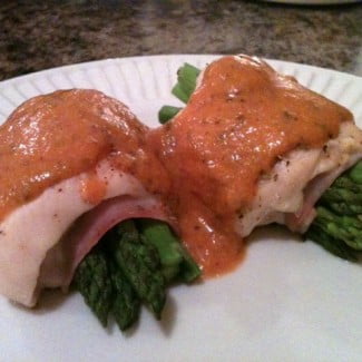 Chicken Roulade with asparagus, sauced.