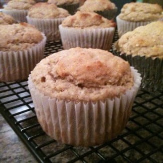 Breakfast muffins are sitting on a cooling rack.