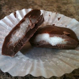 Two Peppermint Patties on a paper plate.