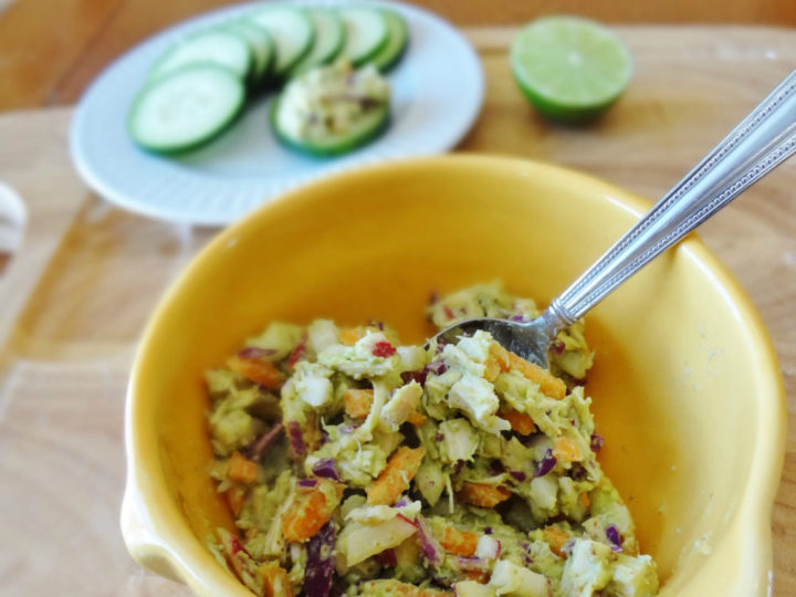 Avocado chicken salad in a yellow bowl
