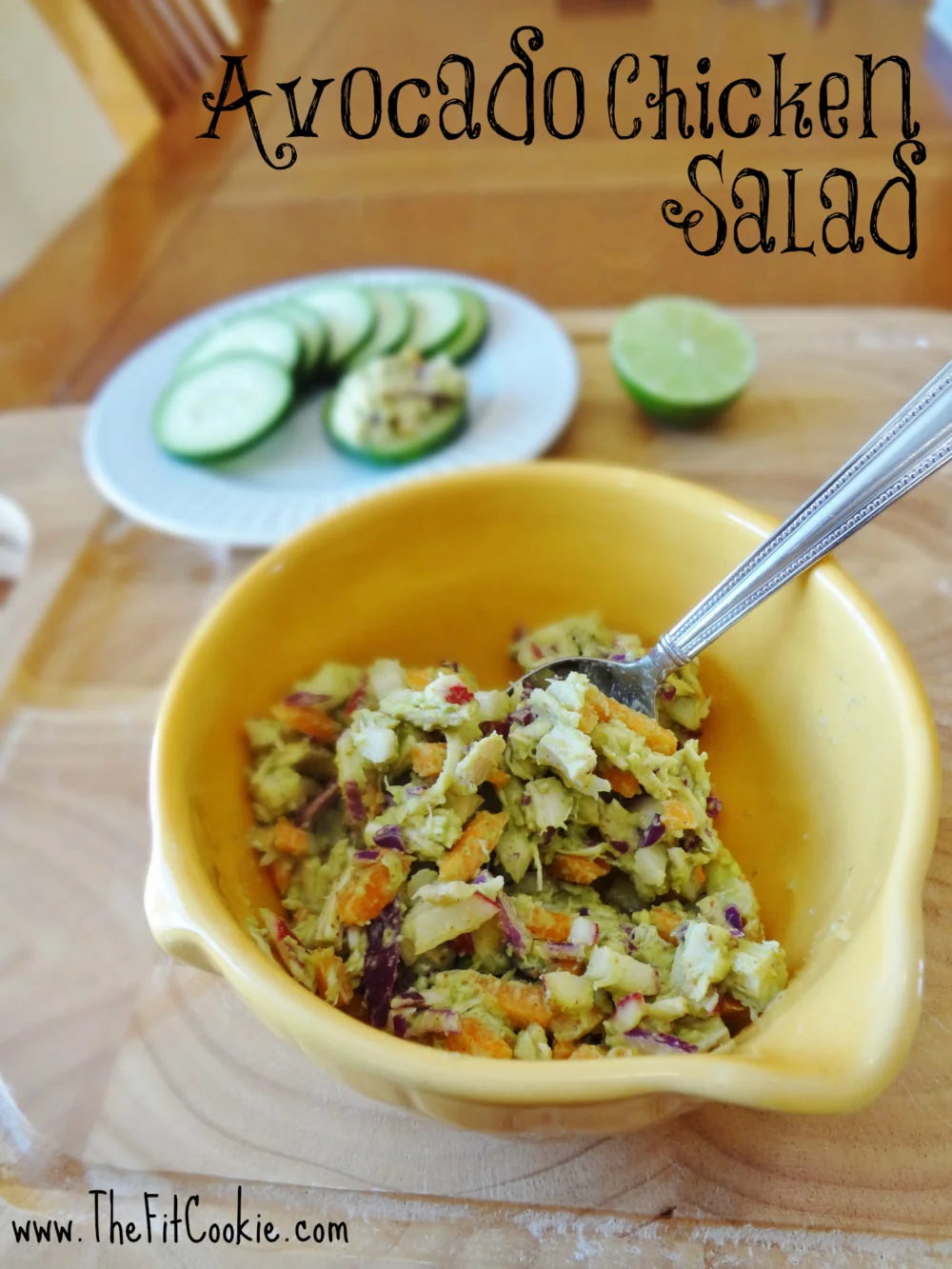 Avocado chicken salad in a yellow bowl