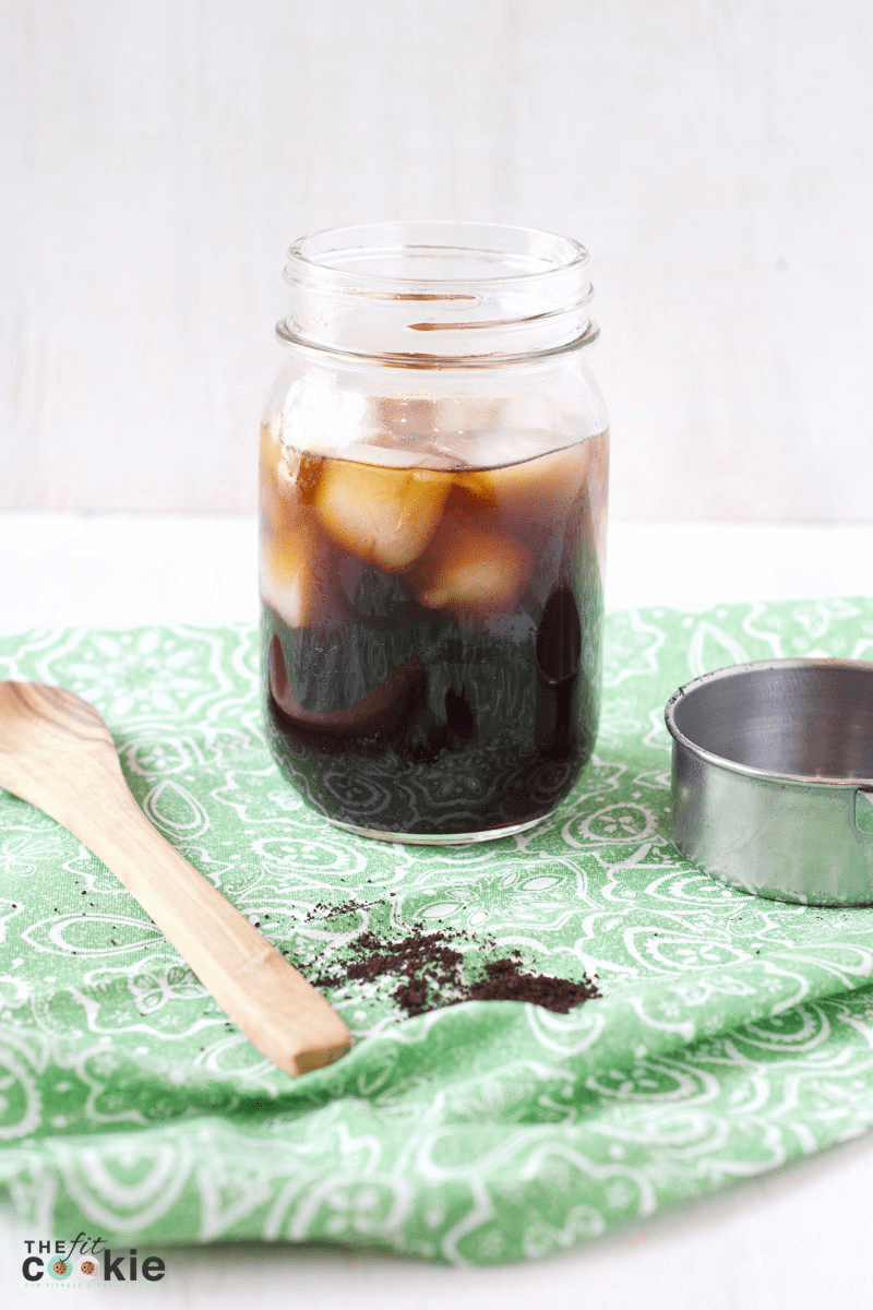glass jar of cold brew coffee and ice