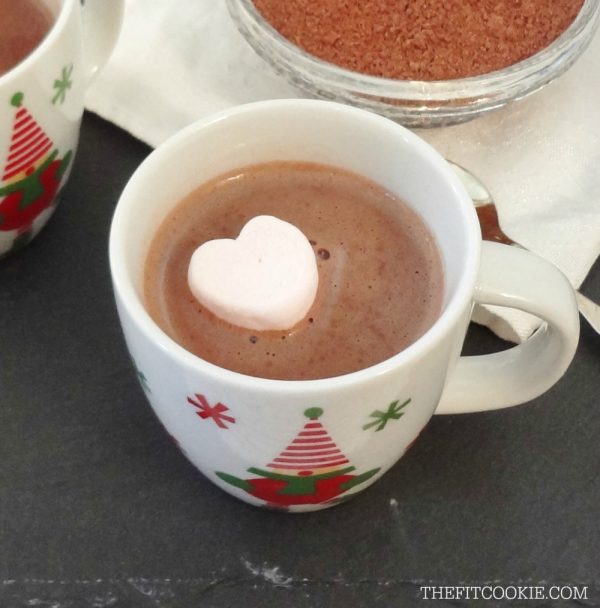 mug of vegan hot chocolate next to dairy free hot cocoa mix