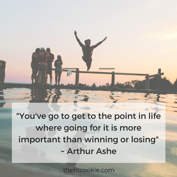 photo of friends swimming in a lake with a motivational quote by Arthur Ashe