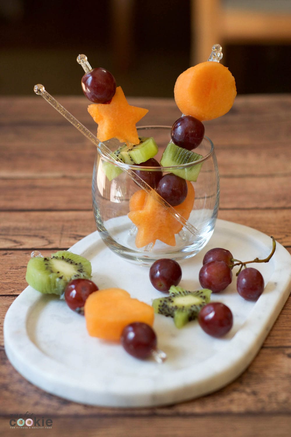 Here's a creative way to serve fruit: Fun Shape Fruit Kabobs! Serve with your favorite fruit dip or yogurt for snacks or party appetizers - @thefitcookie #paleo #vegan