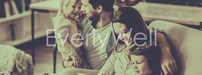 family sitting on a couch with words "EverlyWell" overlaid 