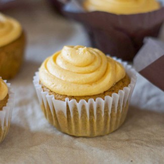 Pumpkin spice cupcakes with cream cheese frosting.