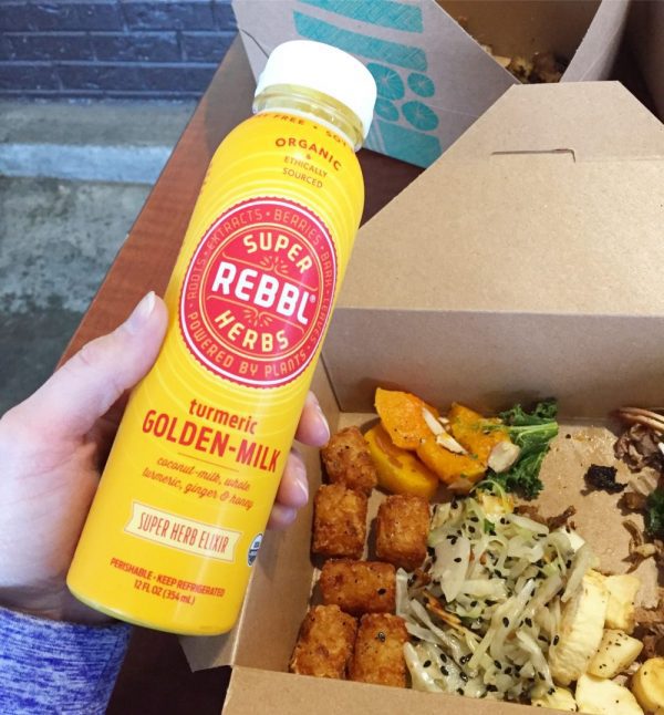 bottle of Rebbl Herbs turmeric milk with Whole Foods lunch 