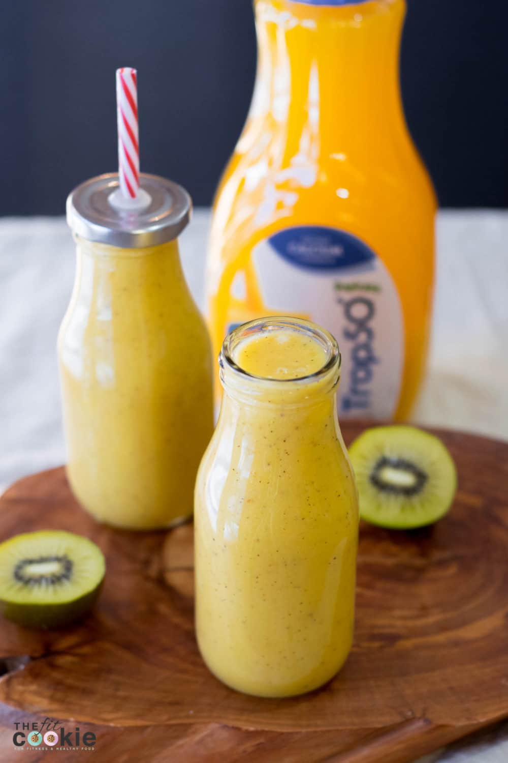 Escape to the tropics with this lower sugar Sunny Tropical Smoothie, it's vegan and lower in sugar! - @TheFitCookie #smoothie #glutenfree #vegan 
