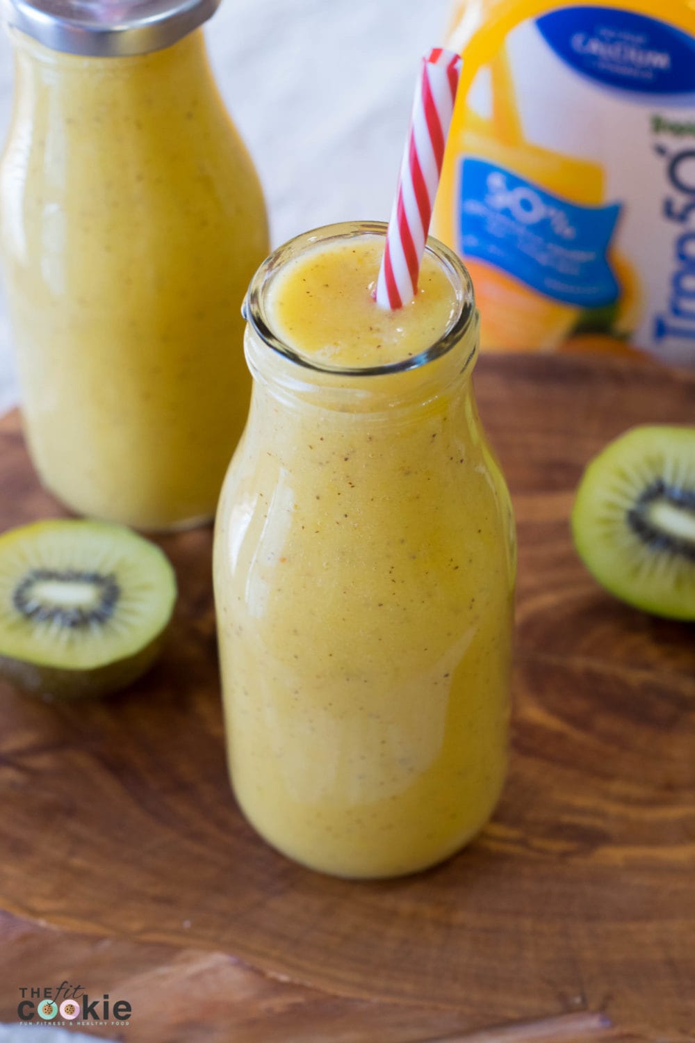 Escape to the tropics with this lower sugar Sunny Tropical Smoothie, it's vegan and lower in sugar! - @TheFitCookie #smoothie #glutenfree #vegan 
