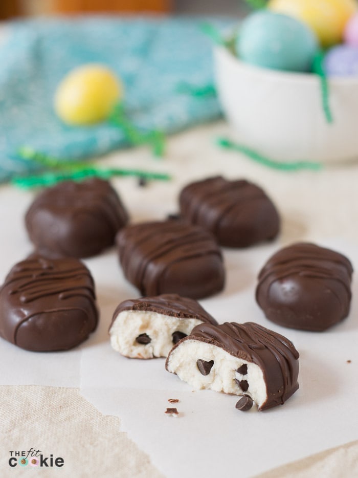 chocolate cookie dough egg split in half to see the chocolate chip cookie dough inside. 