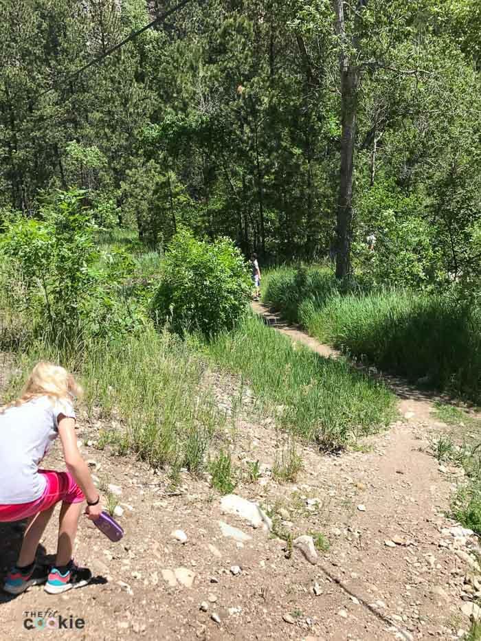 If you're looking for a short but fun hike in Spearfish Canyon in the Black Hills, check out the Community Caves! This trail isn't for everyone, but it's fun and worth the effort if you can make the steep hike - @TheFitCookie