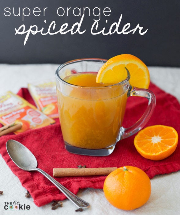 This delicious Super Orange Spiced Cider will warm you up on chilly evenings and fill your home with the wonderful smell of cinnamon and cloves! Plus, this vitamin drink is gluten free and full of vitamins and minerals for immune support - #AD @TheFitCookie #FallImmuneSupport #glutenfree 