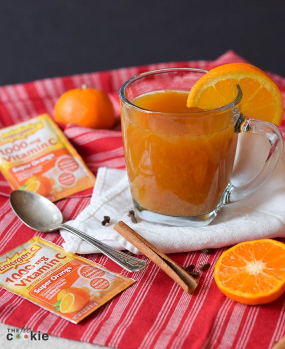 This delicious Super Orange Spiced Cider will warm you up on chilly evenings and fill your home with the wonderful smell of cinnamon and cloves! Plus, this vitamin drink is gluten free and full of vitamins and minerals for immune support - #AD @TheFitCookie #FallImmuneSupport #glutenfree 