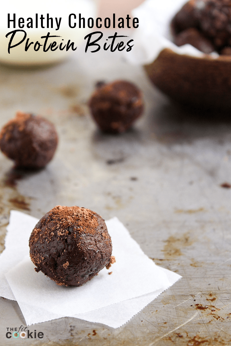 These Healthy Chocolate Protein Bites have a secret ingredient that makes them creamy! They are smooth, low carb, fudgy chocolate treats made with protein powder and healthy fats to keep the chocolate cravings at bay | thefitcookie.com #vegan #protein #lowcarb #chocolate