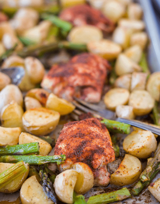 Looking for a healthy and easy weeknight dinner? Make this delicious Sheet Pan Barbecue Chicken with Potatoes and Asparagus for a complete meal ready in under 40 minutes - @TheFitCookie #grainfree #chicken #dairyfree 