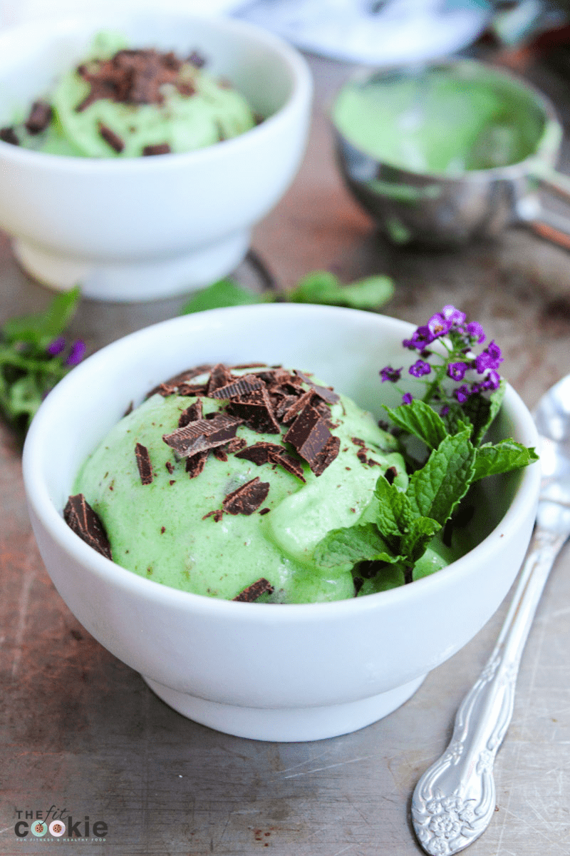 green nice cream with chopped chocolate on top