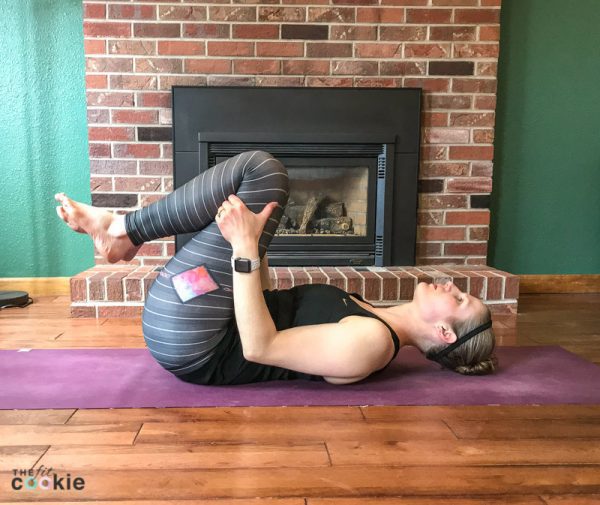 knees to chest yoga pose and lower back stretch