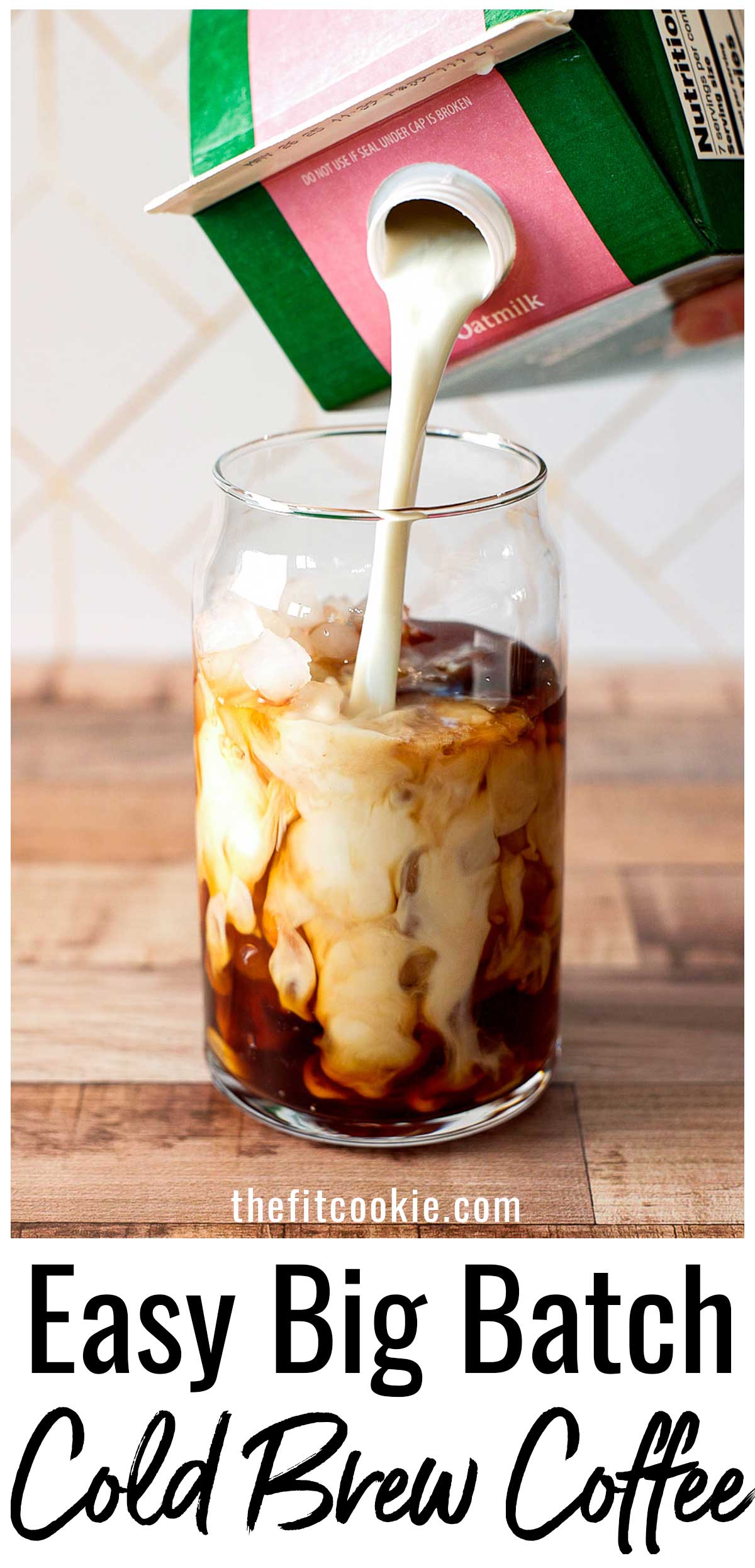 Carton of oatmilk being poured into a glass of iced cold brew coffee with text reading “Easy Big Batch Cold Brew Coffee.”