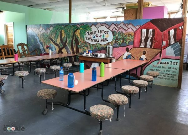 kitchen area at the Cabaret Baptist Children's Home in Cabaret Haiti, tables with seats