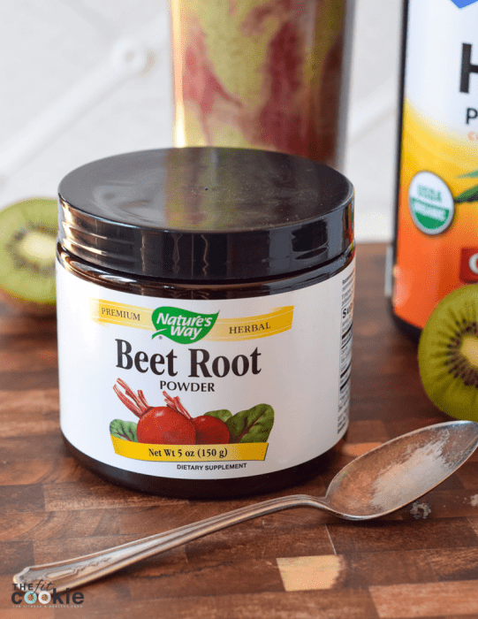 container of Nature's Way beet root powder in front of vegan cherry kiwi smoothie