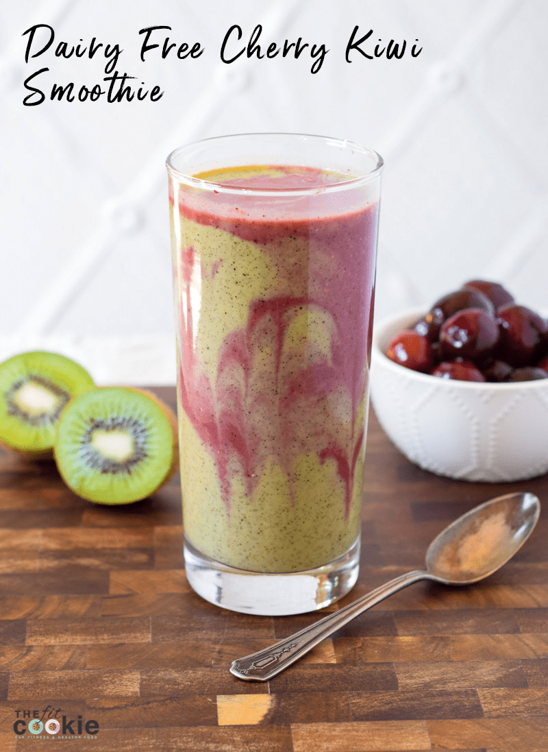 dairy free gluten free cherry kiwi smoothie in a tall glass with text overlay