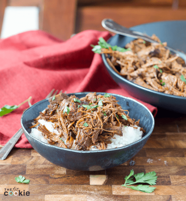 Save time on weeknight dinners with this delicious Slow Cooker Smokey Beef Barbacoa. It's gluten free and you can serve it over rice or make tacos! - @TheFitCookie #glutenfree #dairyfree #slowcooker