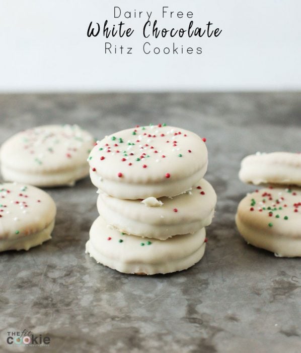 stack of three dairy free white chocolate ritz cookies with sprinkles on top