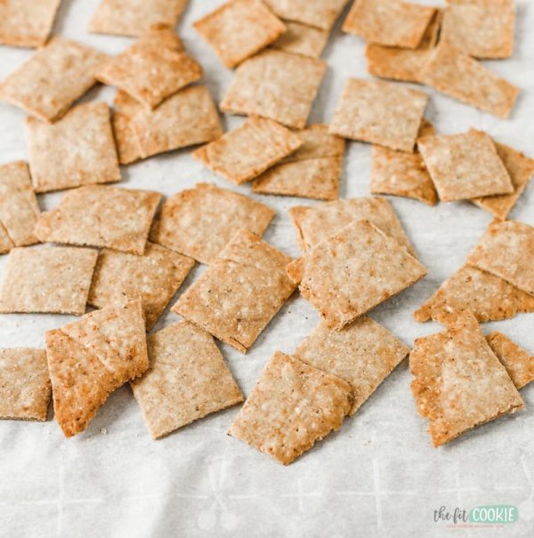 gluten free Za'atar crackers scattered on a parchment paper