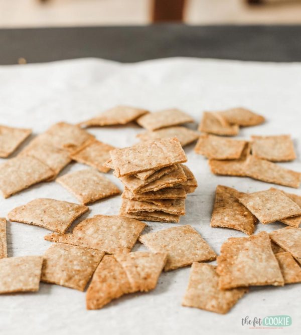 stack of gluten free za'atar crackers on parchment paper