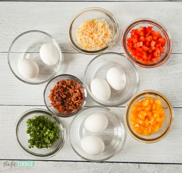 overhead photo of ingredients in glass bowls on a white table