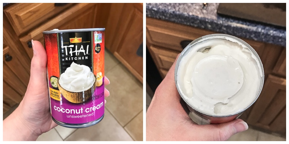 photo of hand holding a can of coconut cream.