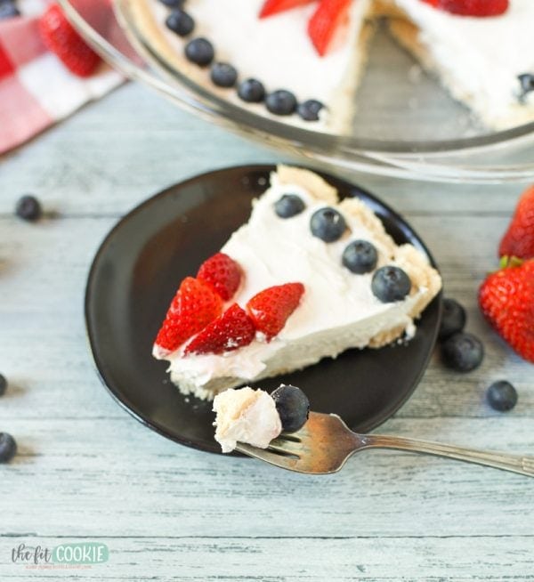 slice of vegan no bake cheesecake with a bite on a fork