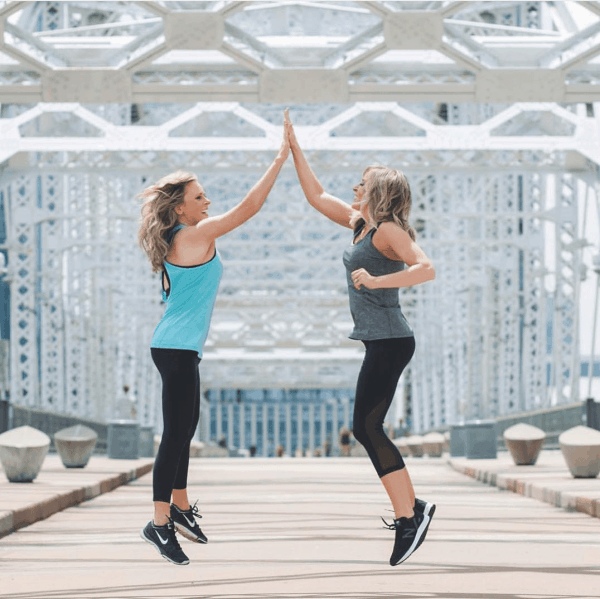 2 women jumping - vacation workouts