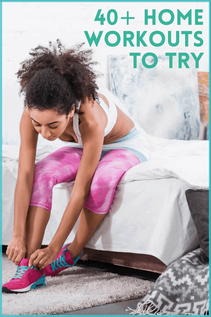 woman tying shoes at home ready to workout