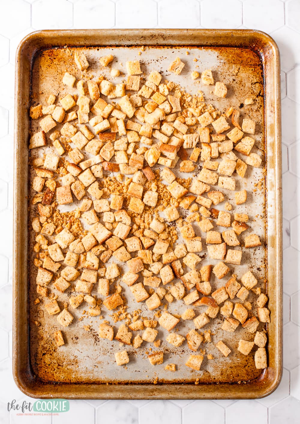 metal sheet pan filled with homemade croutons