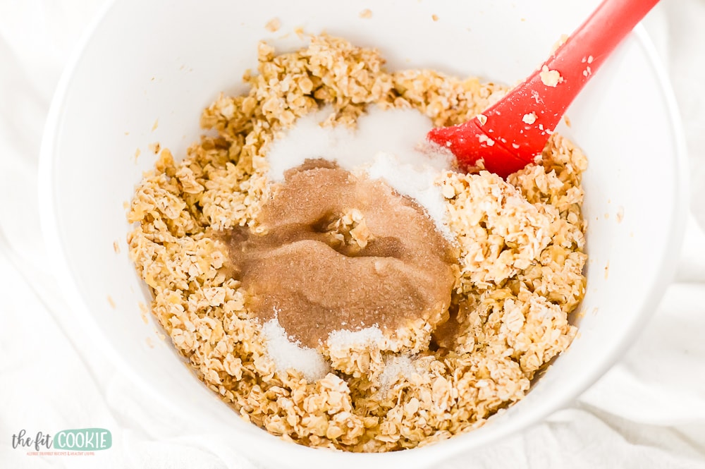 white mixing bowl with pineapple oatmeal bar mixture 
