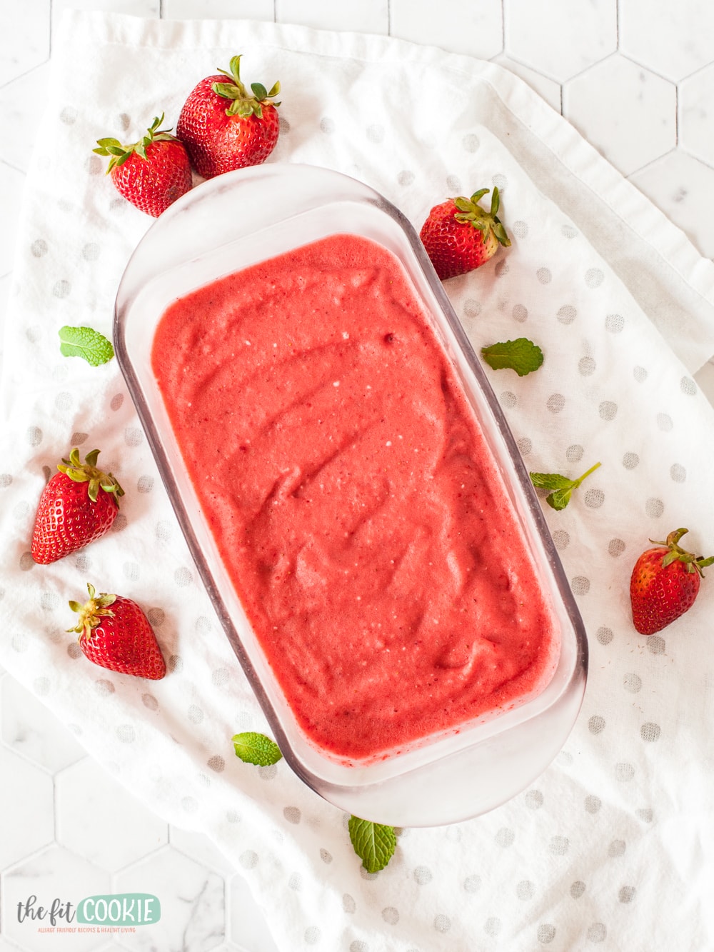 quick strawberry ice cream in a glass pan