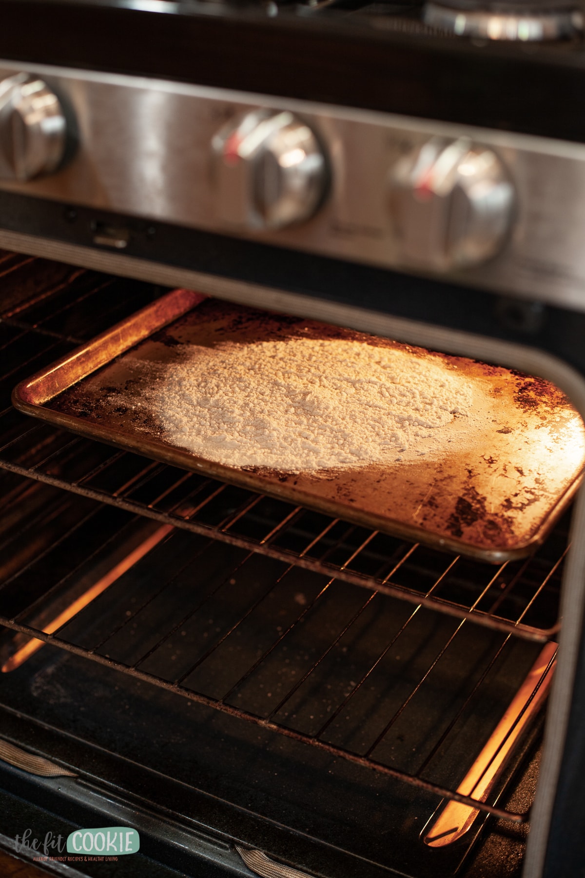 cookie sheet in the oven with flour on it