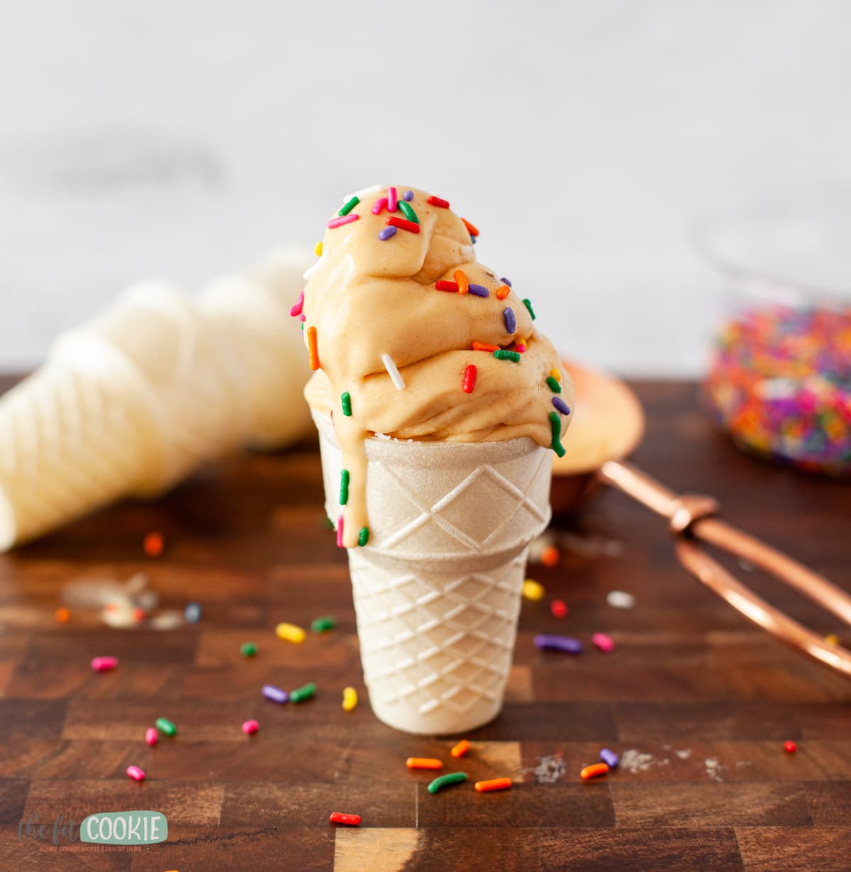 dairy free roasted peach ice cream on a gluten free cone
