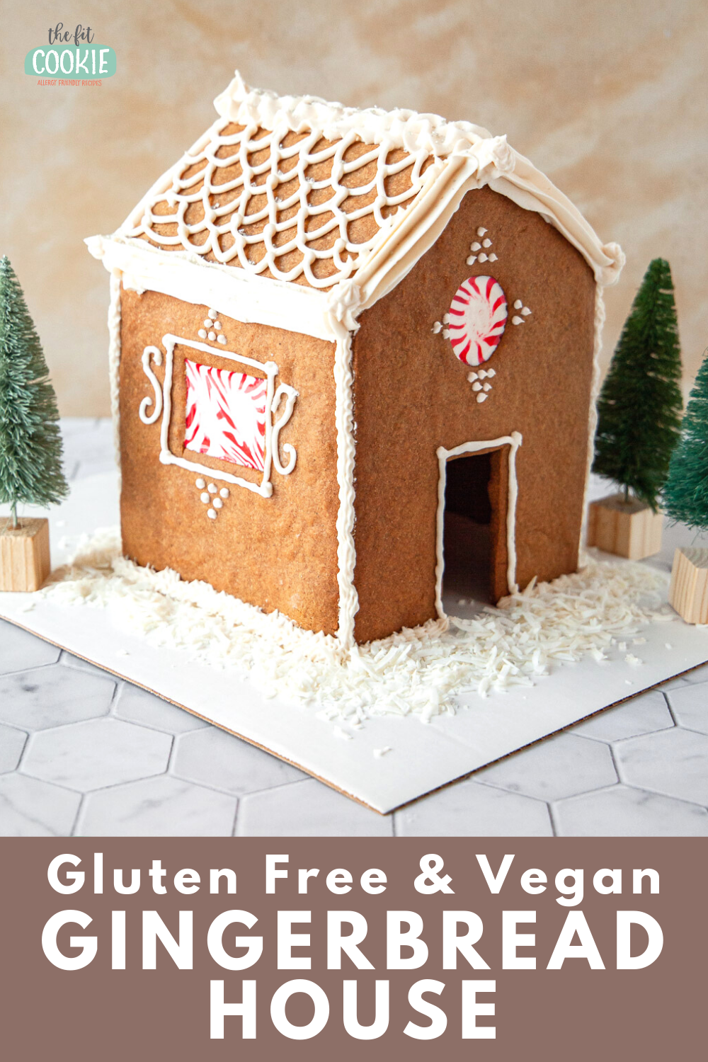 photo of decorated gingerbread house with text overlay 