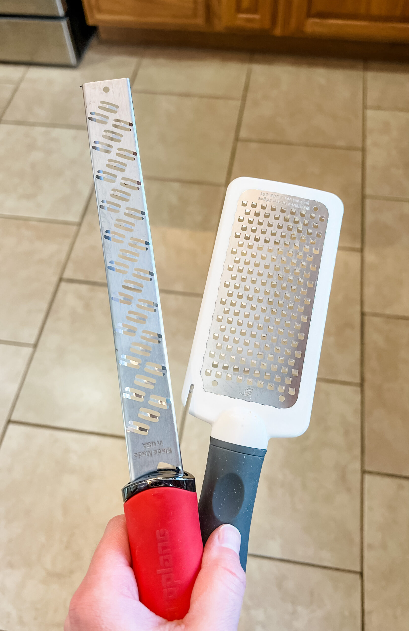 photo of microplane and grater used to level edges of gingerbread house pieces