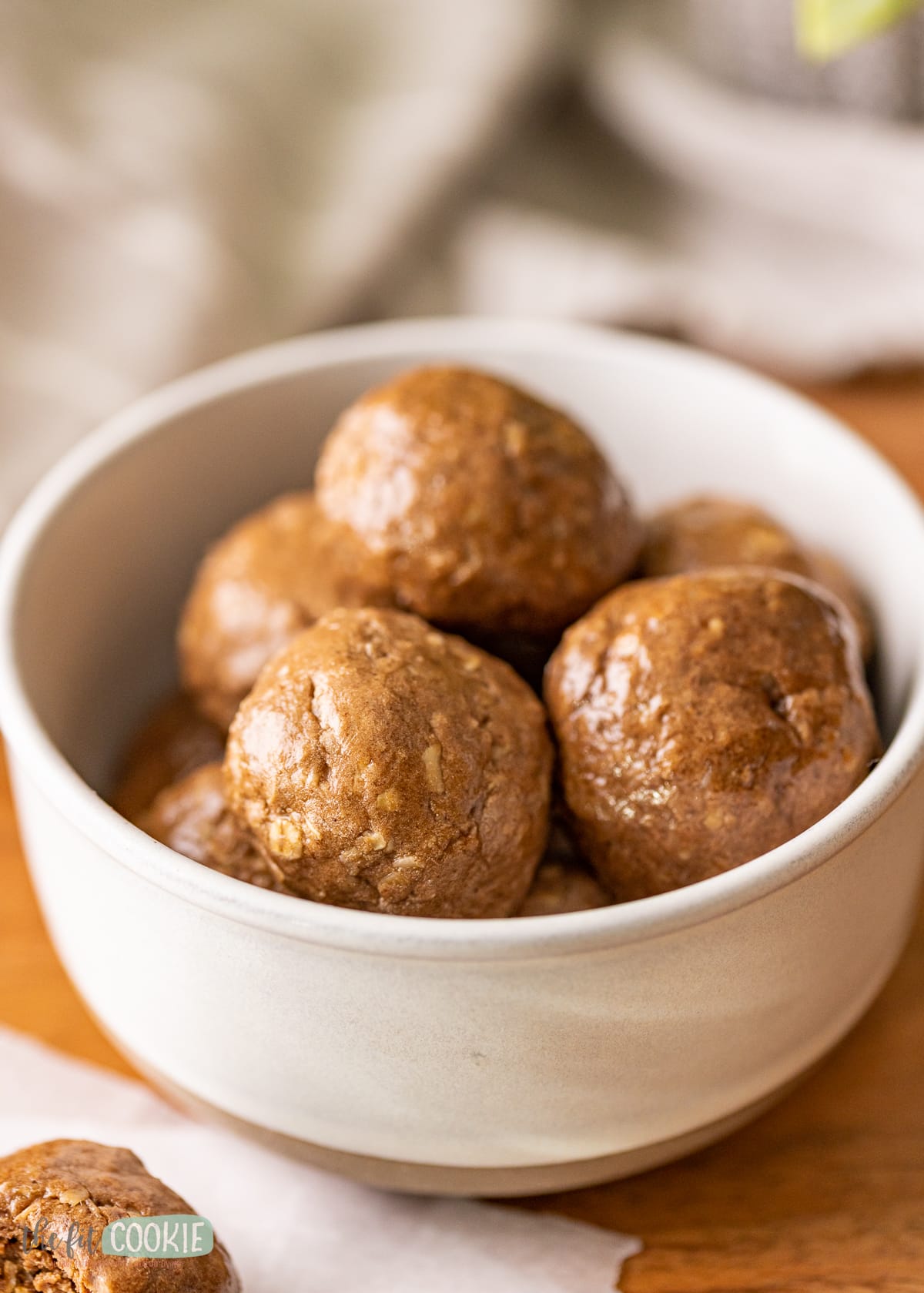 close up photo of mocha snack bites in a white bowl. 