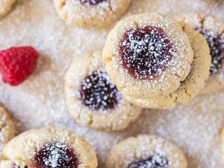 Valentine's Day-themed raspberry shortbread cookies dusted with powdered sugar.