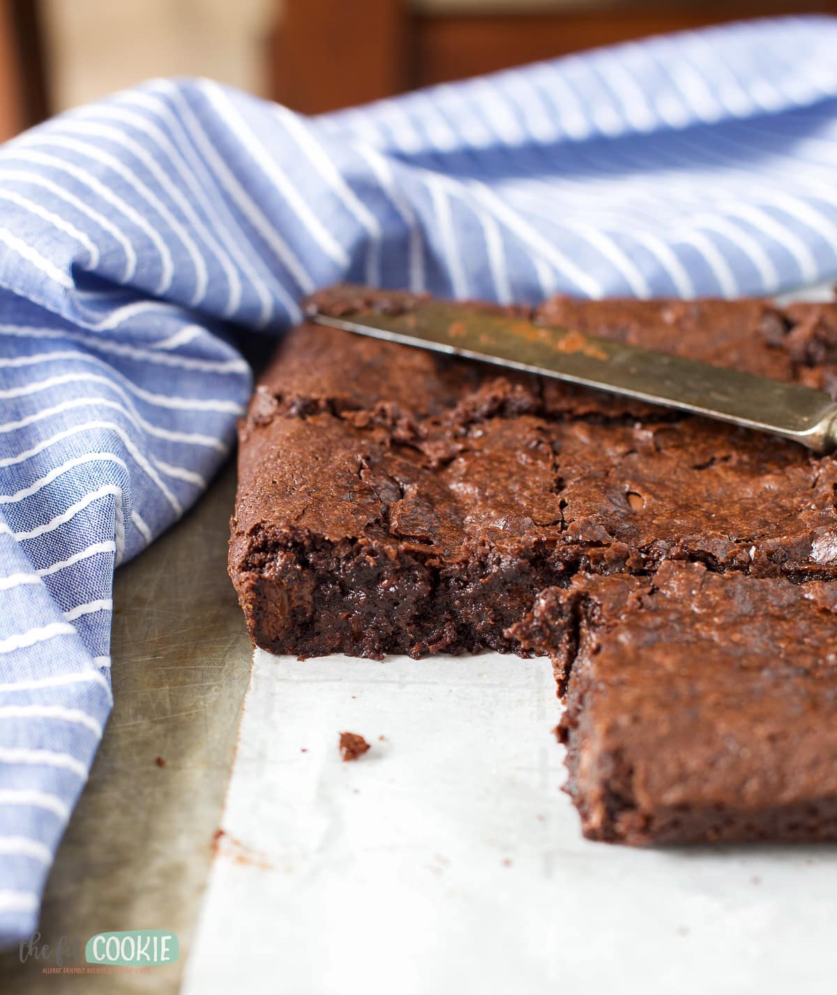 close up photo of cut brownies showing how fudgy they are inside. 