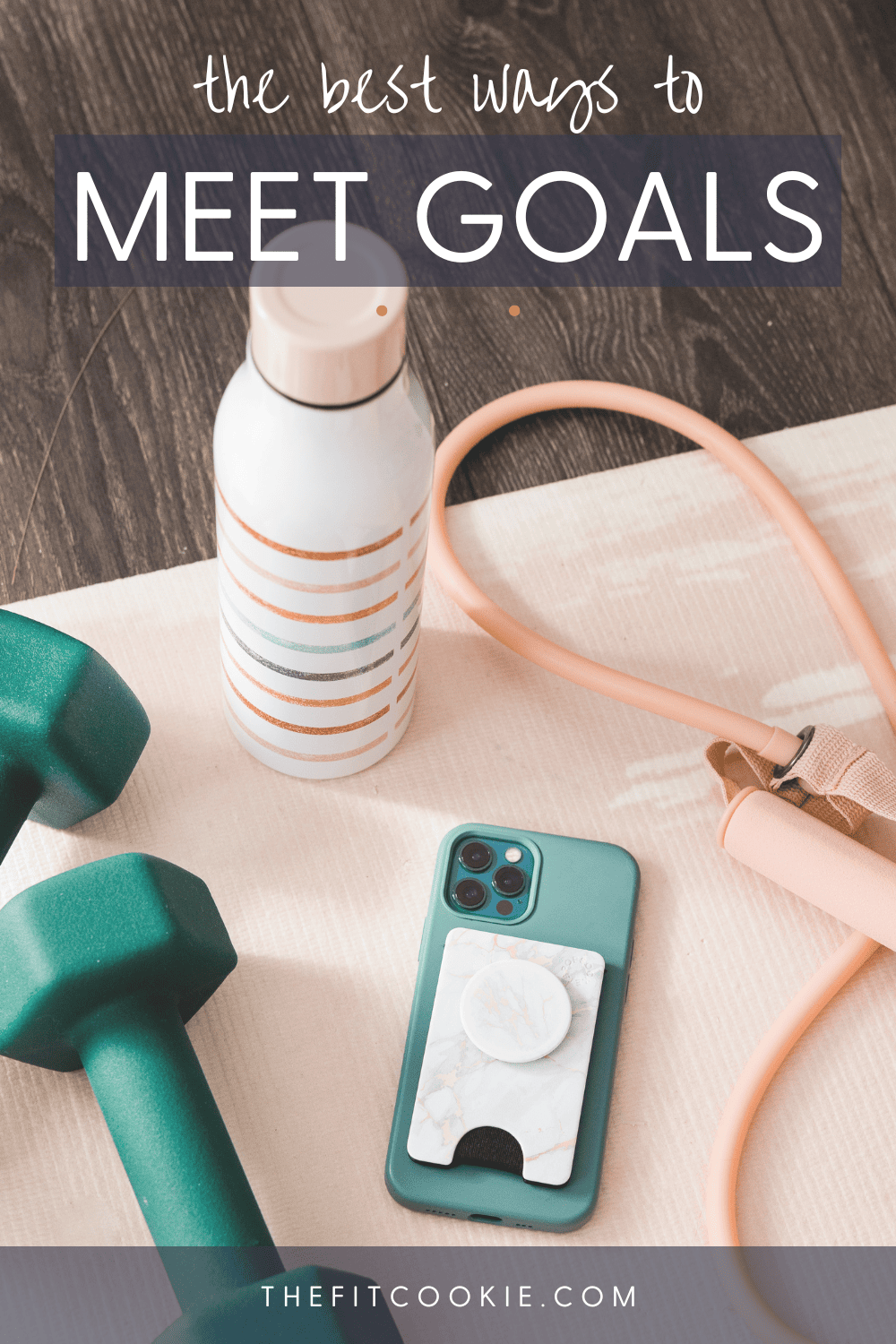 photo of fitness equipment with text overlay about how to meet goals. 