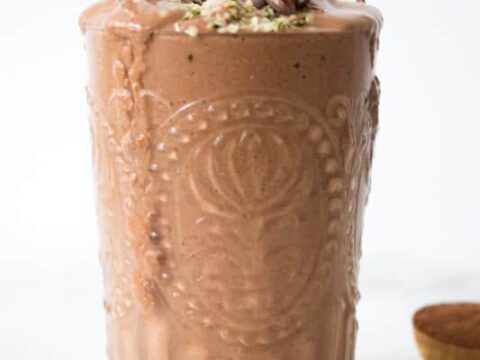 A chocolate smoothie with pistachios and chia seeds.