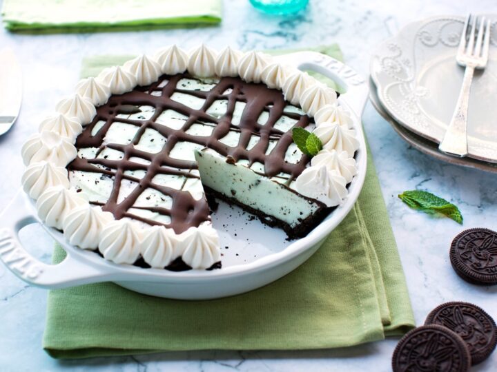 Oreo ice cream pie in a white bowl.