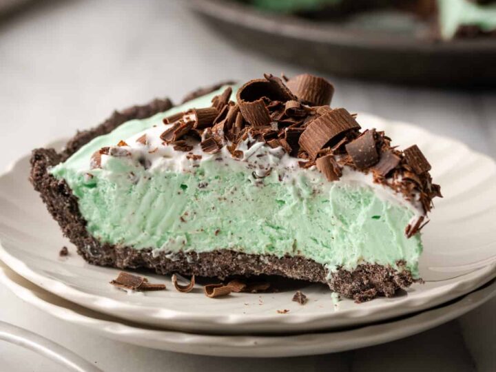 A slice of mint ice cream pie on a plate.