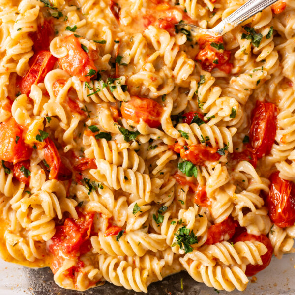 A flavorful dish of feta pasta with tomatoes and herbs.